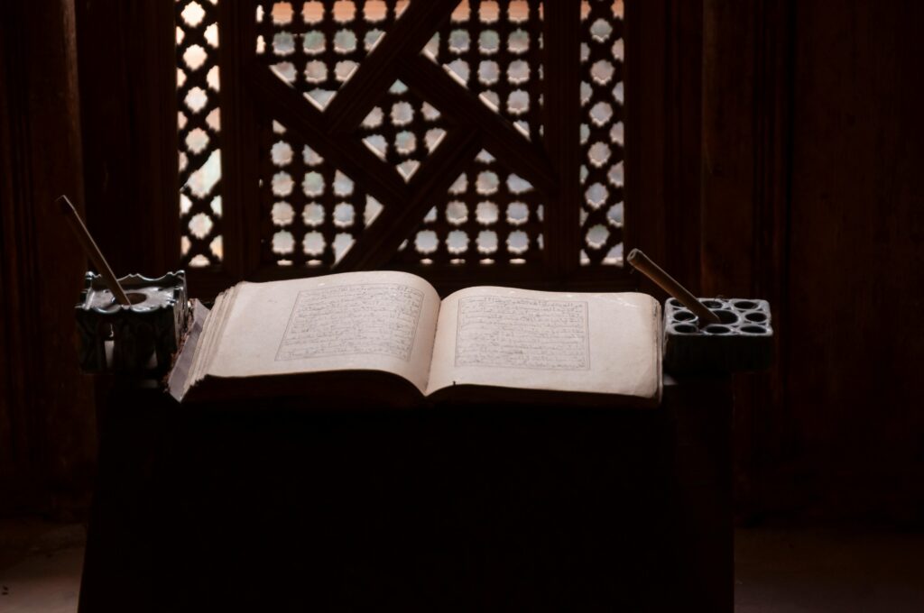 Ancient manuscript on display at Ben Youssef Madrasa in Marrakech, Morocco.